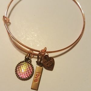 Adjustable bangle with charms